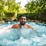 Firefly happy man enjoying ice bath full of ice in open garden 4480